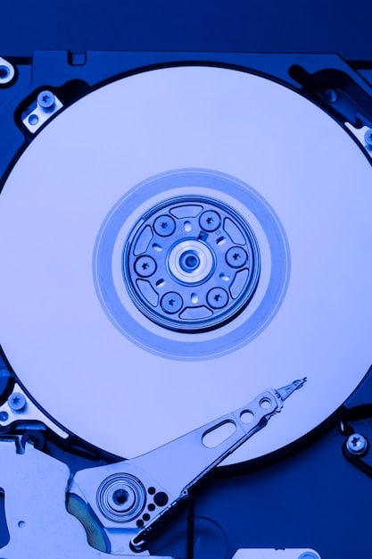 A close-up of a Solid State Drive (SSD) and a Hard Disk Drive (HDD) side-by-side, highlighting the physical differences and internal components.