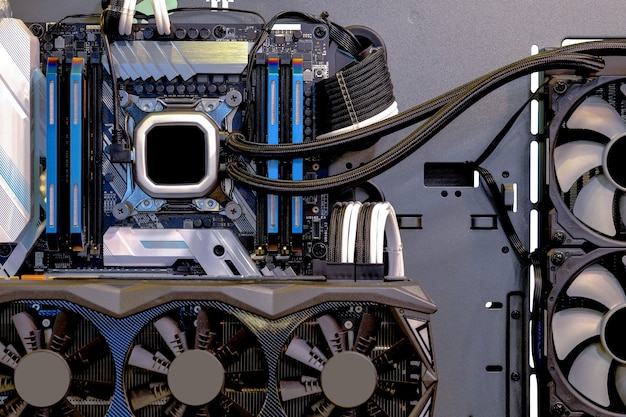 An image showcasing the internal components of a high-end gaming PC, including the CPU, GPU, RAM, and motherboard, highlighting the advanced technology and intricate design that contribute to superior gaming performance and capabilities.
