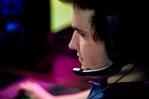 A close-up photo of a professional mobile esports player competing in a tournament in the US, showing intense focus and determination on their face as they interact with their smartphone during a crucial match. The background is blurred to emphasize the player's concentration.