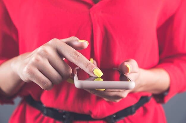 A close-up shot of a person's hands intensely playing a mobile game on their smartphone. The focus is on the fingers rapidly tapping the screen, highlighting the skill and precision required for competitive mobile gaming. The game displayed on the screen should be a recognized title like PUBG Mobile or Call of Duty: Mobile.