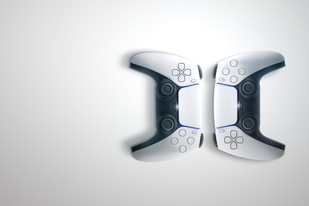 A split-screen image of a PlayStation 5 DualSense controller. On one side, the adaptive trigger is visibly engaged, demonstrating the increased resistance when pulling it. On the other side, the trigger is in its relaxed state, showing the difference in tension. A close-up on the trigger mechanism helps illustrate the adaptive nature of the technology.