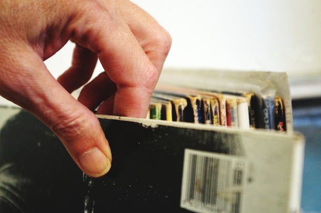 A close-up shot of a person carefully cleaning a vintage video game cartridge with specialized cleaning tools. The background is a clean, organized workspace filled with other game cartridges and vintage consoles. Focus on the details of the cleaning process.